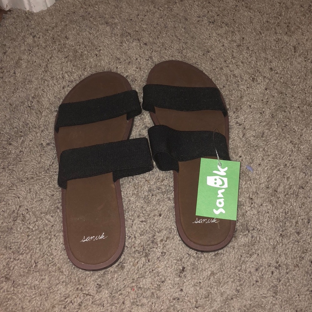 Black Sanuk sandals